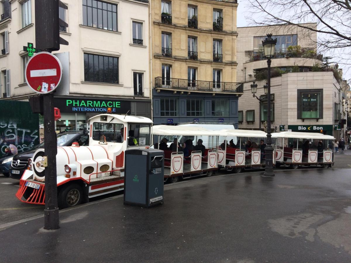 Apartamento Métro Pigalle,Garçonnière 25 m2, 3 per, cabarets théâtres,restaurants,tout confort París Exterior foto